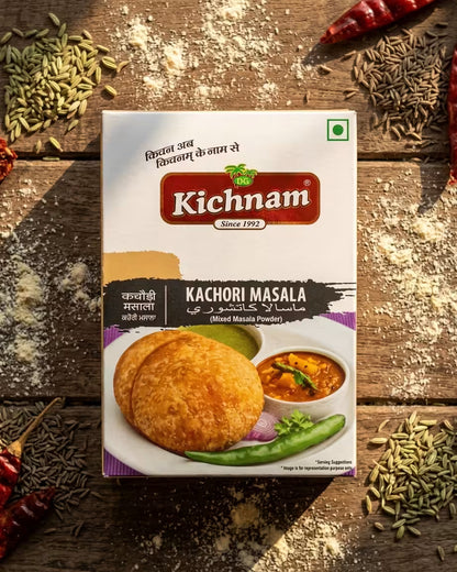 Kichnam Kachori Masala packaging on a wooden surface with spices around
