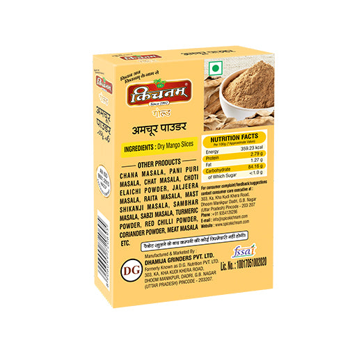 Angled yellow Kichnam Amchur Powder box with dry mango powder.