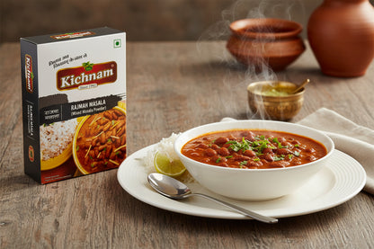 Bowl of beans with a Kichnam Rajma Masala box on a wooden table
