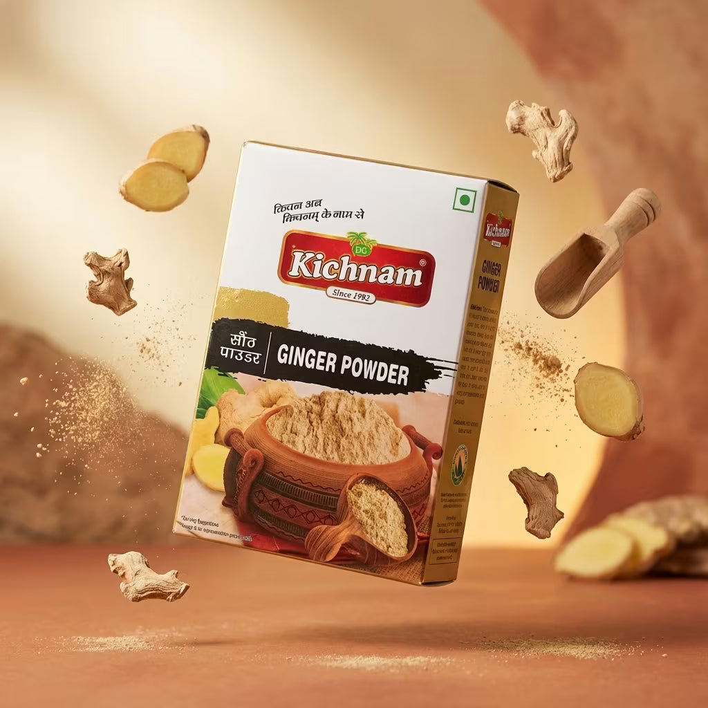 Kichnam Ginger Powder packaging with ginger pieces and a scoop on a warm-toned background . Sonth Powder , Sauth Powder